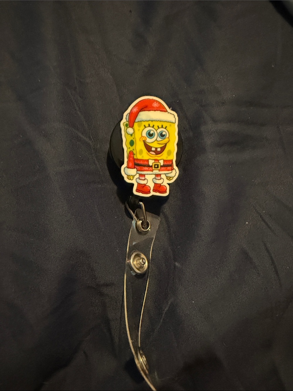 SpongeBob SquarePants Badge Reel – Yellow and Red Holiday Santa Design